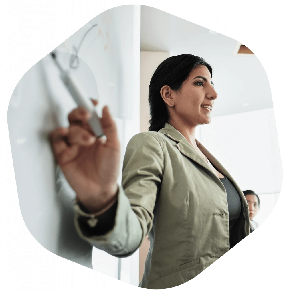 Woman doing presentation with board in office meet